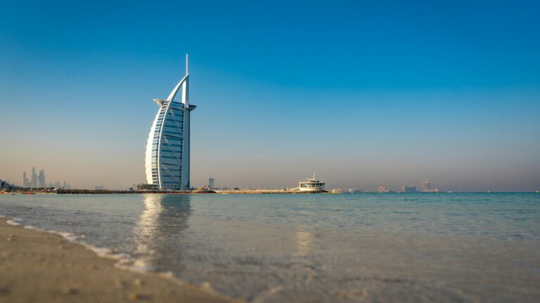 Burj Al Arab tour landmark viewed across the beach in Dubai